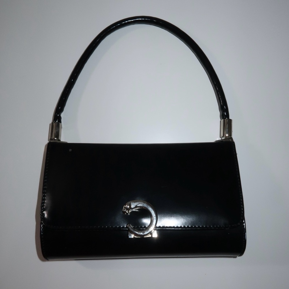 elegant black jaguar mini handbag / clutch